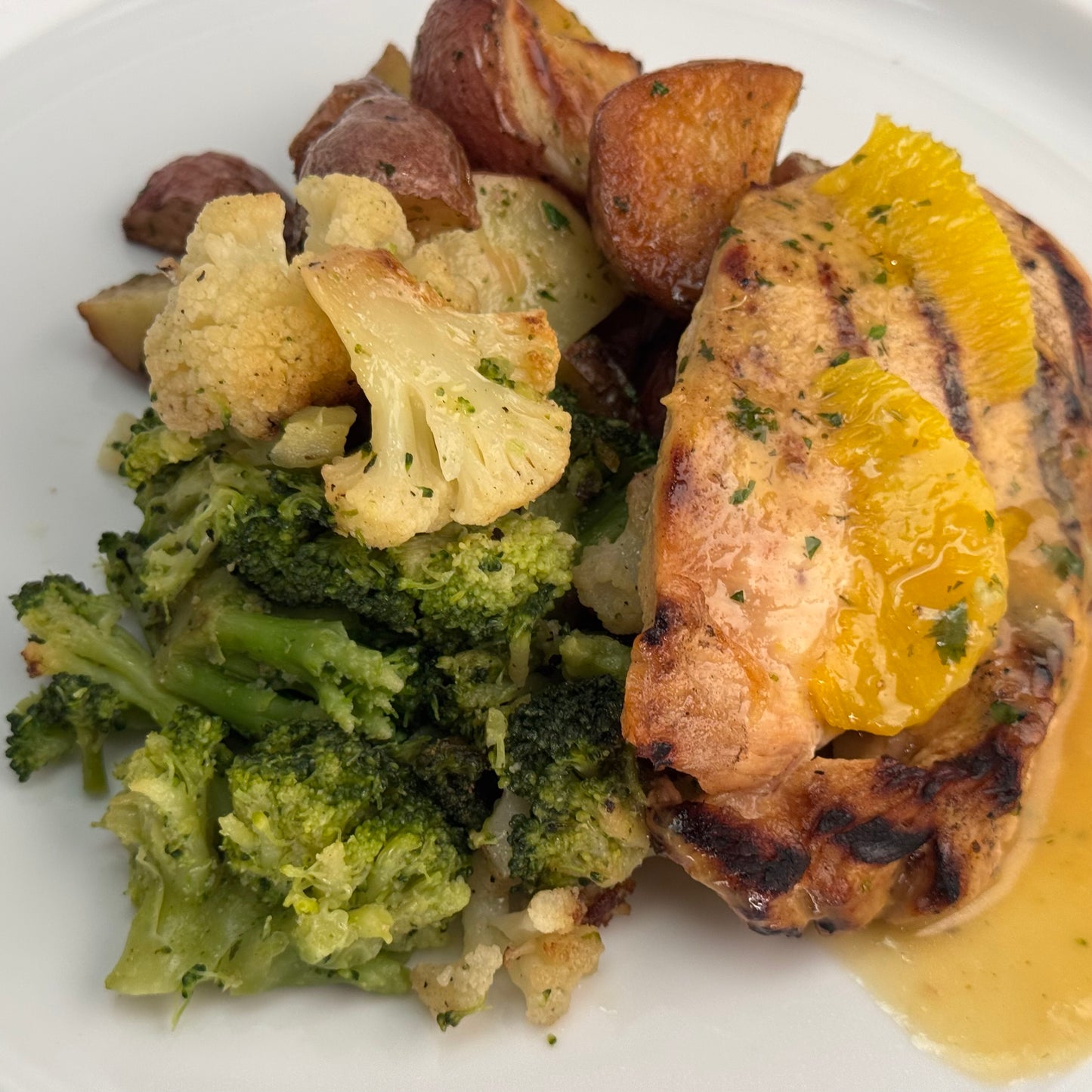 Grilled Citrus Chicken with Roasted Potatoes and Roasted Broccoli/Cauliflower