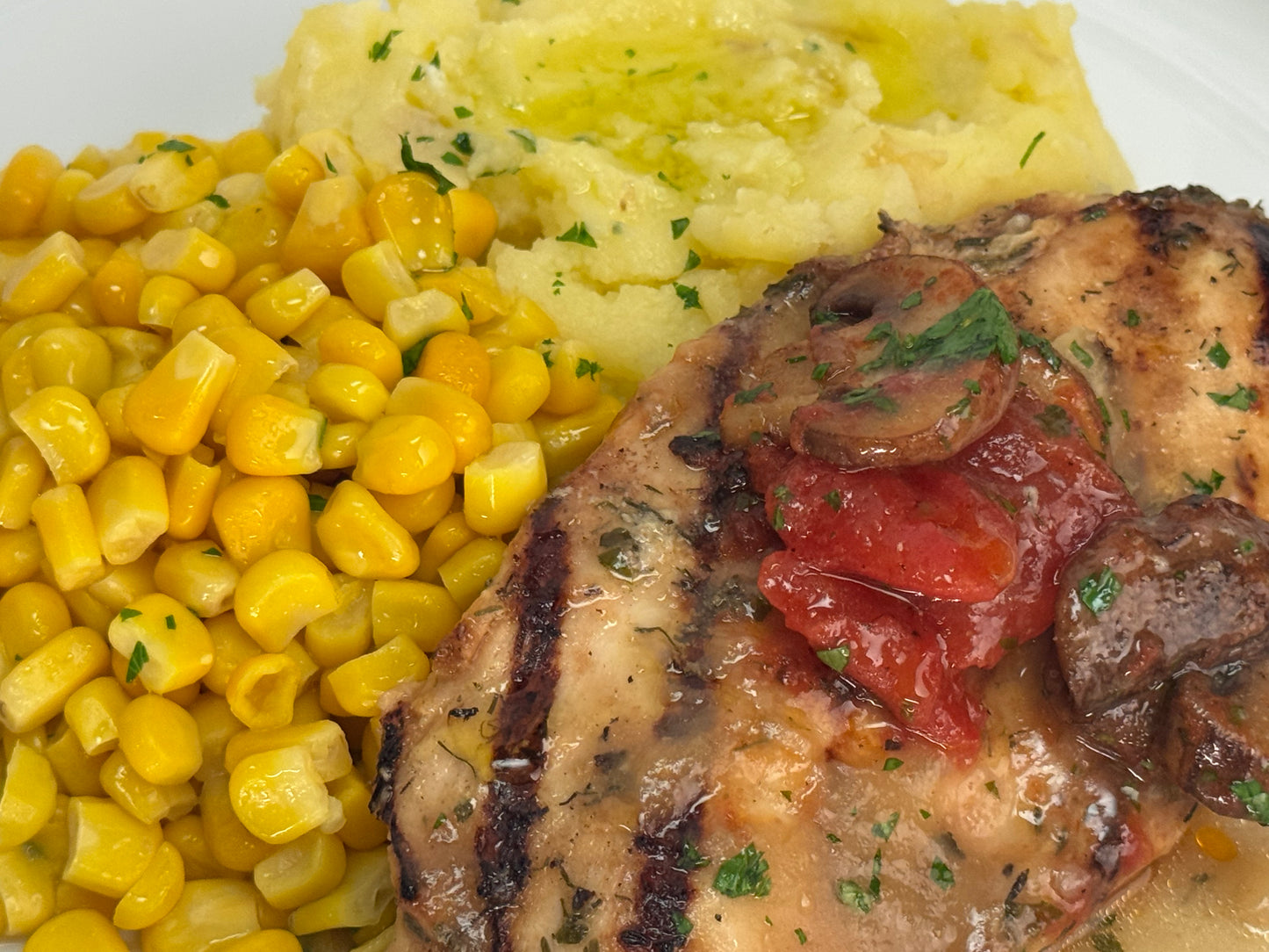 Mushroom chicken with smashed yukon potatoes and sweet corn